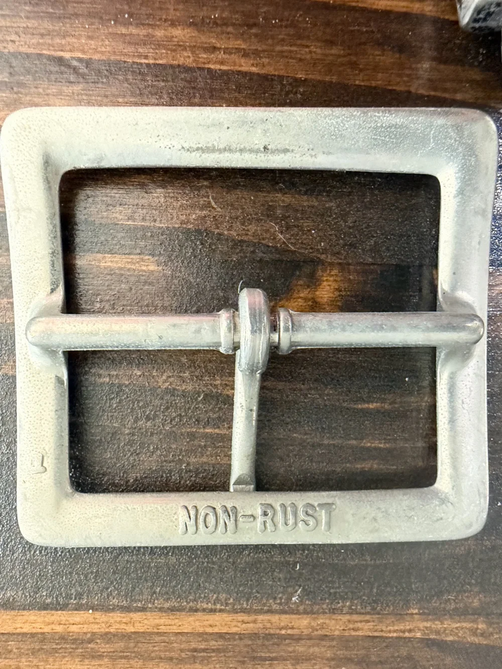Lot of 6 Assorted Metal Belt Buckles with Leather Accent. One is Solid Brass.